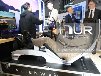 Visitors explore Hexagon's new technologies, achievements, and exhibits in the technical equipment exhibition area of the 7th China Internat...