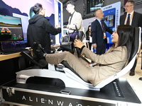 Visitors explore Hexagon's new technologies, achievements, and exhibits in the technical equipment exhibition area of the 7th China Internat...