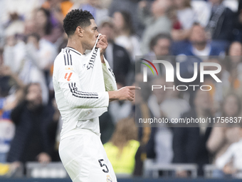 Jude Bellingham of Real Madrid celebrates a goal during the La Liga 2024/25 match between Real Madrid and Osasuna at Santiago Bernabeu Stadi...