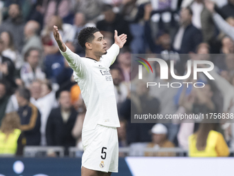 Jude Bellingham of Real Madrid celebrates a goal during the La Liga 2024/25 match between Real Madrid and Osasuna at Santiago Bernabeu Stadi...