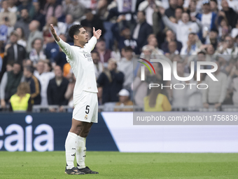 Jude Bellingham of Real Madrid celebrates a goal during the La Liga 2024/25 match between Real Madrid and Osasuna at Santiago Bernabeu Stadi...