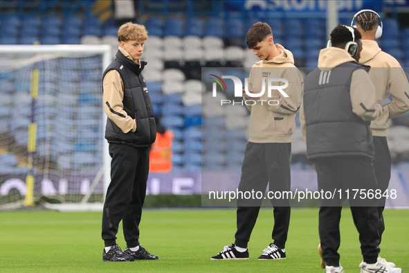 Sam Chambers (Leeds United) walks the pitch with Charlie Crew (Leeds United) before the Sky Bet Championship match between Leeds United and...