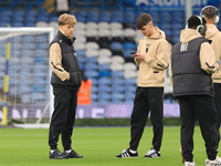 Sam Chambers (Leeds United) walks the pitch with Charlie Crew (Leeds United) before the Sky Bet Championship match between Leeds United and...