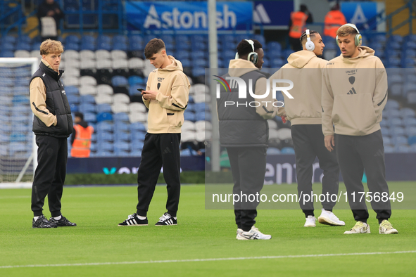 Sam Chambers (Leeds United) walks the pitch with Charlie Crew (Leeds United) before the Sky Bet Championship match between Leeds United and...