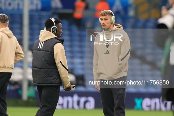 Wilfried Gnonto (Leeds United) in Black Panther headphones chats with Joel Piroe (Leeds United) in Naruto headphones before the Sky Bet Cham...