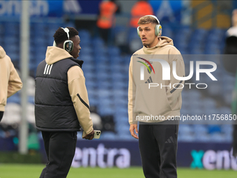 Wilfried Gnonto (Leeds United) in Black Panther headphones chats with Joel Piroe (Leeds United) in Naruto headphones before the Sky Bet Cham...