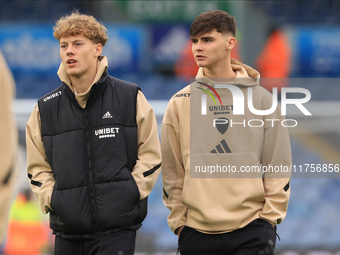 Sam Chambers (Leeds United) walks the pitch with Charlie Crew (Leeds United) before the Sky Bet Championship match between Leeds United and...