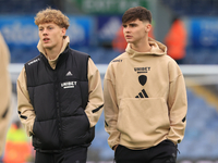 Sam Chambers (Leeds United) walks the pitch with Charlie Crew (Leeds United) before the Sky Bet Championship match between Leeds United and...