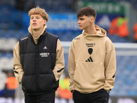 Sam Chambers (Leeds United) walks the pitch with Charlie Crew (Leeds United) before the Sky Bet Championship match between Leeds United and...