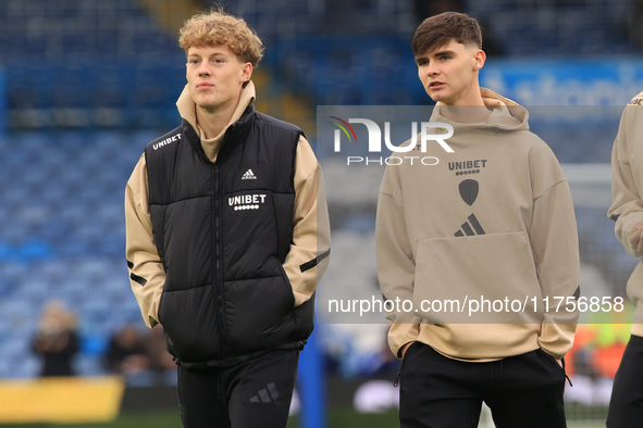 Sam Chambers (Leeds United) walks the pitch with Charlie Crew (Leeds United) before the Sky Bet Championship match between Leeds United and...