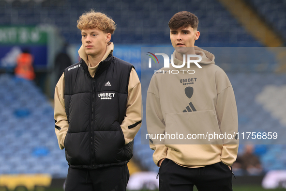 Sam Chambers (Leeds United) walks the pitch with Charlie Crew (Leeds United) before the Sky Bet Championship match between Leeds United and...