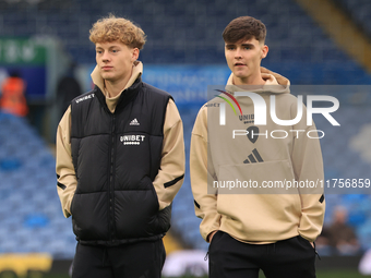 Sam Chambers (Leeds United) walks the pitch with Charlie Crew (Leeds United) before the Sky Bet Championship match between Leeds United and...