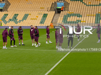 Bristol City players inspect the pitch prior to the Sky Bet Championship match between Norwich City and Bristol City at Carrow Road in Norwi...