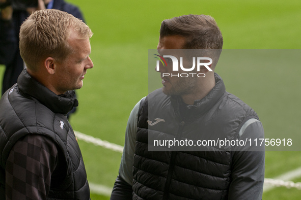 Bristol City Manager, Liam Manning, and Jack Wilshere have a conversation before the Sky Bet Championship match between Norwich City and Bri...