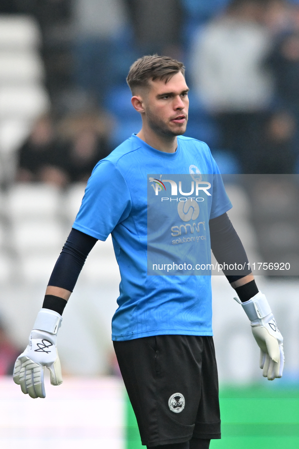 Goalkeeper Will Blackmore (28 Peterborough United) warms up during the Sky Bet League 1 match between Peterborough and Cambridge United at L...