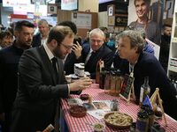 France's Minister for the Economy, Finance and Industry, Antoine Armand, speaks to personnel at the ''Benoit Badin'' condiments stand as he...