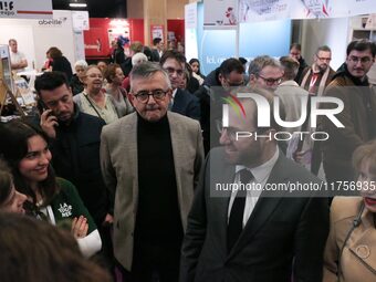 France's Minister for the Economy, Finance and Industry, Antoine Armand (R), accompanied by former French centrist UDI Member of Parliament...