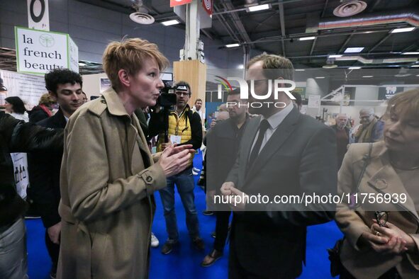 France's Minister for the Economy, Finance and Industry, Antoine Armand (center), speaks with French journalist Natacha Polony (left) as he...