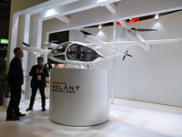 Visitors visit the VOLANT AEROTECH Aviation booth at the ''Future Low Altitude Travel'' area of the Automobile Pavilion at the 7th China Int...