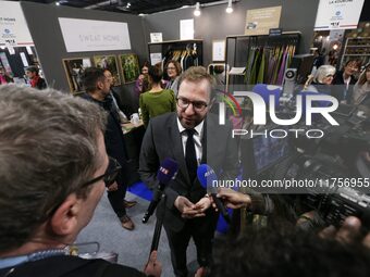 France's Minister for the Economy, Finance and Industry, Antoine Armand, speaks with the press as he attends the ''Made in France'' (MIF Exp...