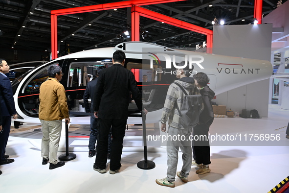 Visitors visit the VOLANT AEROTECH Aviation booth at the ''Future Low Altitude Travel'' area of the Automobile Pavilion at the 7th China Int...