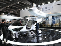 Visitors visit the Tcab Tech booth at the ''Future Low Altitude Travel'' area of the Automobile Pavilion at the 7th China International Impo...