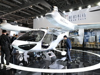 Visitors visit the Tcab Tech booth at the ''Future Low Altitude Travel'' area of the Automobile Pavilion at the 7th China International Impo...