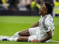 Eder Militao of Real Madrid CF is injured on the ground during the La Liga EA Sports 2024/25 football match between Real Madrid CF and CA Os...