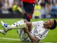 Eder Militao of Real Madrid CF is injured on the ground during the La Liga EA Sports 2024/25 football match between Real Madrid CF and CA Os...