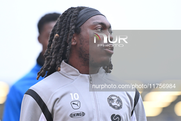 Abraham Odoh (10 Peterborough United) warms up during the Sky Bet League 1 match between Peterborough and Cambridge United at London Road in...