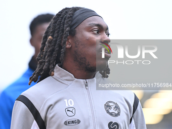 Abraham Odoh (10 Peterborough United) warms up during the Sky Bet League 1 match between Peterborough and Cambridge United at London Road in...