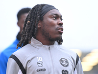 Abraham Odoh (10 Peterborough United) warms up during the Sky Bet League 1 match between Peterborough and Cambridge United at London Road in...