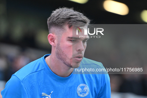 Goalkeeper Will Blackmore (28 Peterborough United) warms up during the Sky Bet League 1 match between Peterborough and Cambridge United at L...