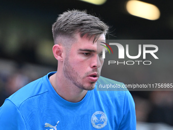 Goalkeeper Will Blackmore (28 Peterborough United) warms up during the Sky Bet League 1 match between Peterborough and Cambridge United at L...