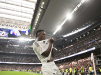 Vinicius Jr of Real Madrid celebrates a goal during the La Liga 2024/25 match between Real Madrid and Osasuna at Santiago Bernabeu Stadium i...