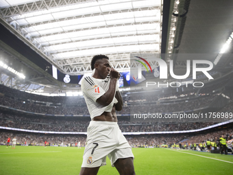 Vinicius Jr of Real Madrid celebrates a goal during the La Liga 2024/25 match between Real Madrid and Osasuna at Santiago Bernabeu Stadium i...