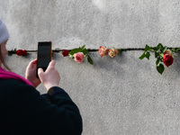 Flowers at Berlin Wall Memorial after the commemoration ceremony marking the 35th anniversary of the fall of the Berlin Wall. Berlin, German...