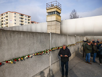 Flowers at Berlin Wall Memorial after the commemoration ceremony marking the 35th anniversary of the fall of the Berlin Wall. Berlin, German...