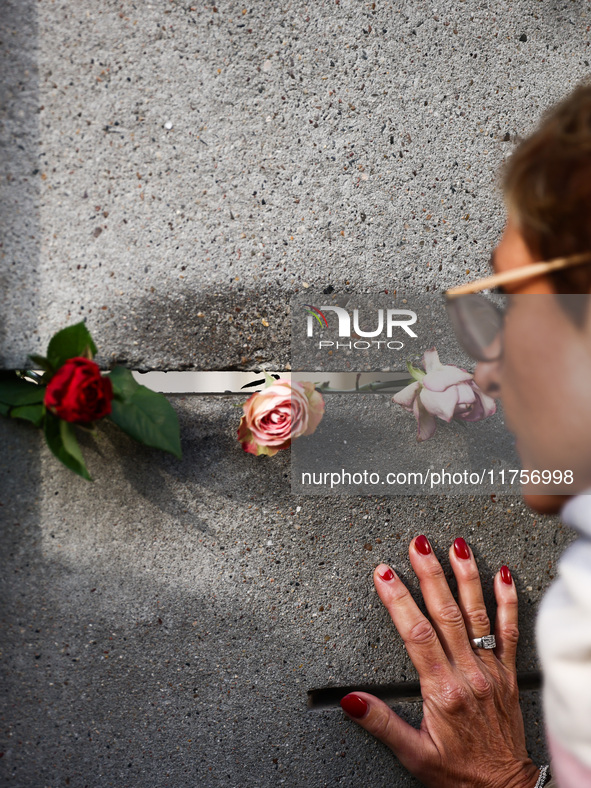 Flowers at Berlin Wall Memorial after the commemoration ceremony marking the 35th anniversary of the fall of the Berlin Wall. Berlin, German...