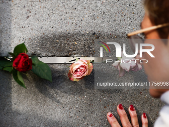 Flowers at Berlin Wall Memorial after the commemoration ceremony marking the 35th anniversary of the fall of the Berlin Wall. Berlin, German...