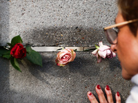 Flowers at Berlin Wall Memorial after the commemoration ceremony marking the 35th anniversary of the fall of the Berlin Wall. Berlin, German...