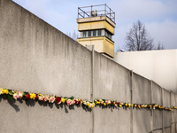 Flowers at Berlin Wall Memorial after the commemoration ceremony marking the 35th anniversary of the fall of the Berlin Wall. Berlin, German...