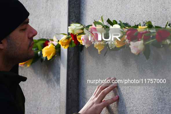 Flowers at Berlin Wall Memorial after the commemoration ceremony marking the 35th anniversary of the fall of the Berlin Wall. Berlin, German...