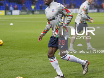 Jay Matete #28 of Bolton Wanderers F.C. warms up during the Sky Bet League 1 match between Stockport County and Bolton Wanderers at the Edge...