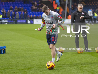 Szabolcs Schon #23 of Bolton Wanderers F.C. warms up during the Sky Bet League 1 match between Stockport County and Bolton Wanderers at the...