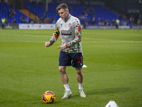 Szabolcs Schon #23 of Bolton Wanderers F.C. warms up during the Sky Bet League 1 match between Stockport County and Bolton Wanderers at the...