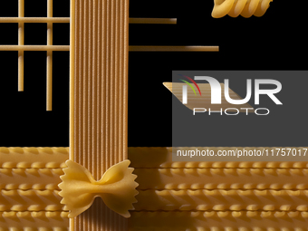 A minimalist still life features a variety of Italian pasta shapes on a dark background. This close-up showcases the intricate textures and...