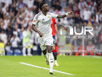 Vinicius Junior of Real Madrid CF celebrates his goal during the La Liga EA Sports 2024/25 football match between Real Madrid CF and CA Osas...