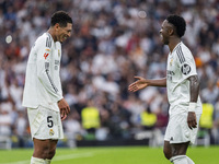 Vinicius Junior of Real Madrid CF (R) celebrates his goal with Jude Bellingham of Real Madrid CF (L) during the La Liga EA Sports 2024/25 fo...