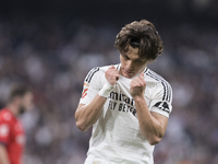 Fran Garcia of Real Madrid reacts to a missed opportunity during the La Liga 2024/25 match between Real Madrid and Osasuna at Santiago Berna...